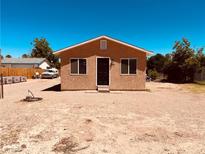 Charming single-story home with a simple exterior and clear blue sky at 378 W Thomas Ave, Overton, NV 89040