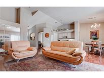 An open concept living room features modern furnishings and lots of natural light at 5000 Red Rock St # 237, Las Vegas, NV 89118