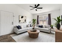 Bright living room featuring modern decor, neutral colors, and ample natural light at 6955 N Durango Dr # 3089, Las Vegas, NV 89149