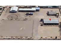 Spacious horse property, featuring multiple outbuildings, riding arena, and round pen at 8440 La Cienega St, Las Vegas, NV 89123