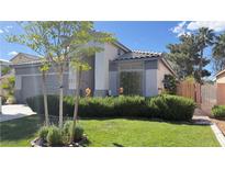 Charming single-story home featuring well-manicured lawn and desert landscaping in a desirable neighborhood at 988 Upper Meadows Pl, Henderson, NV 89052