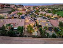 Beautiful single-Gathering home featuring manicured landscaping, stone accents, and a welcoming front entrance at 1 Cerchio Basso, Henderson, NV 89011