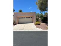 Charming single-story home with a two-car garage and desert landscaping at 3394 Brookfield Dr, Las Vegas, NV 89120