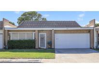 Charming single-story home with an attached garage and well-maintained landscaping in a quiet neighborhood at 3553 Kensbrook St, Las Vegas, NV 89121
