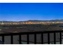 Expansive Las Vegas skyline view from rooftop with vibrant city lights creating a stunning backdrop at 4576 Amazing View St, Las Vegas, NV 89129