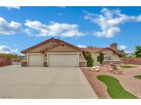 Charming single-story home featuring a spacious driveway and desert landscaping for low maintenance at 9180 Mohawk St, Las Vegas, NV 89139