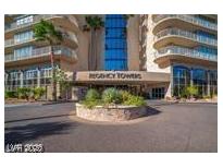 Regency Towers building with elegant entrance, landscaping, and architectural details at 3111 Bel Air Dr # 6E, Las Vegas, NV 89109