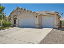 Charming single-story home with a well-maintained front yard, and a two car garage at 3629 Ferrell St, North Las Vegas, NV 89032