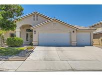 Charming single-story home with a three-car garage and a well-maintained front yard at 3629 Ferrell St, North Las Vegas, NV 89032