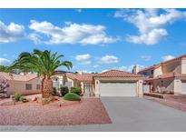 Charming single-story home with a well-manicured front yard and attached two-car garage at 4617 Mancilla St, Las Vegas, NV 89130