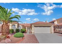 Charming home with well-manicured front yard and mature palm tree at 4617 Mancilla St, Las Vegas, NV 89130