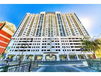 View of a tall white building with a blue sky background on a sunny day at 150 Las Vegas Blvd # 2016, North Las Vegas, NV 89101