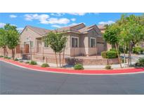 Charming single-story home with a well-maintained front yard and red sidewalk border at 329 Gemstone Hill Ave, North Las Vegas, NV 89031