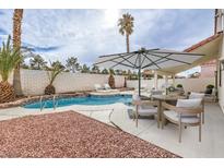 Beautiful backyard pool and patio area, perfect for outdoor entertaining and relaxation at 6 Megan Dr, Henderson, NV 89074