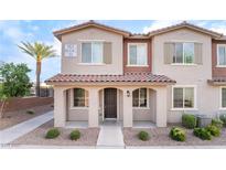 Charming two-story home with a covered entryway and well-maintained landscaping at 965 Nevada State Dr # 15104, Henderson, NV 89002