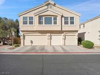A charming two-story home with a three-car garage and beautiful desert landscaping at 4830 Double Down Dr # 102, Las Vegas, NV 89122