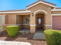 Charming single-story home featuring a covered front porch and low-maintenance landscaping at 5373 Blue Oat Ave, Las Vegas, NV 89141