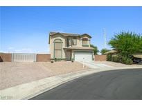 Two-story home with desert landscaping, two-car garage, and low-maintenance yard at 6088 Gulf Island Ave, Las Vegas, NV 89156