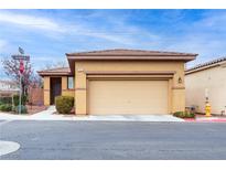 Charming single-story home featuring a two-car garage and desert landscaping at 7611 Redcloud Peak St St, Las Vegas, NV 89166