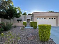 Charming single-story home with a well-manicured front yard and desert landscaping at 2343 Scotch Lake St, Las Vegas, NV 89134