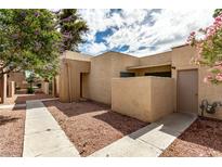 Inviting home featuring desert landscaping, a walkway, and a neutral color palette at 4213 Essex Green Ct, Las Vegas, NV 89110