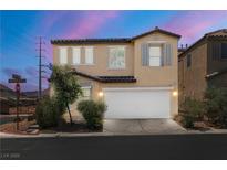 Charming two-story home with a well-manicured front yard and attached two-car garage in a desirable neighborhood at 5695 Merced St, Las Vegas, NV 89148