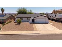 Charming single-story home with desert landscaping and a two-car garage at 616 Fernbrook Dr, Henderson, NV 89002