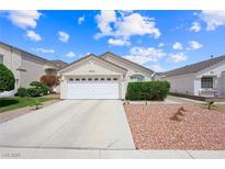 Charming single-story home featuring a well-maintained front yard and a two-car garage at 4336 Desert Dancer Way, Las Vegas, NV 89147