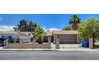 Charming single-story home featuring secure gated access and desert landscaping at 4533 Diamond Head Dr, Las Vegas, NV 89110