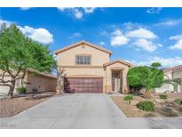 Charming two-story home featuring a well-maintained yard with a two car garage and desert landscaping at , North Las Vegas, NV 89031