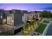 Modern home featuring a sleek design, minimalist landscaping, and a welcoming entrance at 38 Skybird Ct, Las Vegas, NV 89135