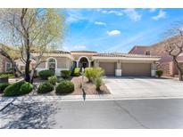 Charming single-story home with a three-car garage and well-manicured landscaping in a quiet neighborhood at 7567 Desertscape Ave, Las Vegas, NV 89178