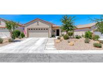 Charming single-story home with a two-car garage and desert landscaping at 2501 Celestial Light Dr, Henderson, NV 89044