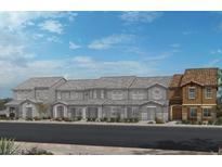 Charming townhome featuring neutral colors and an inviting entrance at 2772 Via Napoli, Henderson, NV 89044