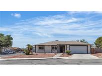 Charming single-story home featuring a well-maintained front yard and inviting curb appeal at 5079 Reno Ct, Las Vegas, NV 89119