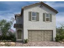 Charming two-story home with neutral stucco, a tiled roof, and well-maintained front yard landscaping at 9243 Charmillin Ct, Las Vegas, NV 89148