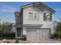 Charming two-story home featuring a two-car garage and inviting front entrance at 9249 Charmillin Ct, Las Vegas, NV 89148