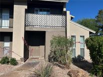 Charming condo with a private entrance, well-maintained landscaping, and a cozy front patio at 526 Sellers Pl, Henderson, NV 89011