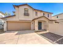 Charming two-story home with a two-car garage and desert landscaping in a well-maintained community at 9073 Spoonbill Ridge Pl, Las Vegas, NV 89143
