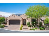 Charming single-story home featuring a paved driveway, manicured landscaping, and a welcoming entrance at 3468 Isle Dr, Las Vegas, NV 89141