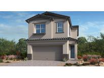 Charming two-story home showcasing a well-kept yard and an attached two-car garage at 336 Taylor St, Henderson, NV 89015