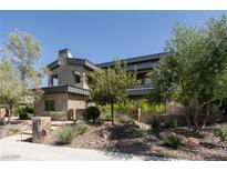 Stunning multi-story home featuring modern architectural design and lush landscaping at 6 Yorkridge Ct, Henderson, NV 89052