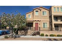 Charming two-story home with well-maintained landscaping and a cozy front porch at 7704 Classy Cashmere Ct, Las Vegas, NV 89149