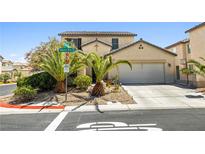 Charming two-story home with well-manicured front yard and a two-car garage at 7724 Somerhill Point Way, Las Vegas, NV 89139