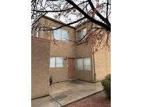 Charming two-story home with a welcoming front door and large windows allowing plenty of natural light at 574 Roxella Ln # C, Las Vegas, NV 89110