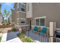 Inviting townhome with a cozy, gated front patio, perfect for enjoying outdoor living at 12348 Golden Wreath Rd # 1, Las Vegas, NV 89183