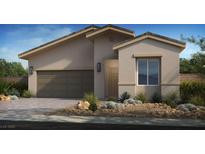 Charming single-story home featuring a two-car garage and desert landscaping at 4180 E Brusca Way, Pahrump, NV 89061
