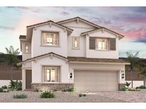 Charming two-story home with a two car garage, neutral paint scheme and desert landscaping at 874 Lorden St, Henderson, NV 89011