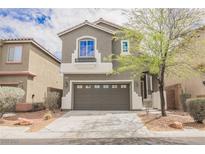 Charming two-story home with a well-maintained front yard and a two car garage in a suburban neighborhood at 9545 Parker Springs Ct, Las Vegas, NV 89166