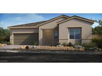 Charming single-story home with a neutral color scheme, a well-manicured lawn, and a two-car garage at 4360 E Brusca Way, Pahrump, NV 89061